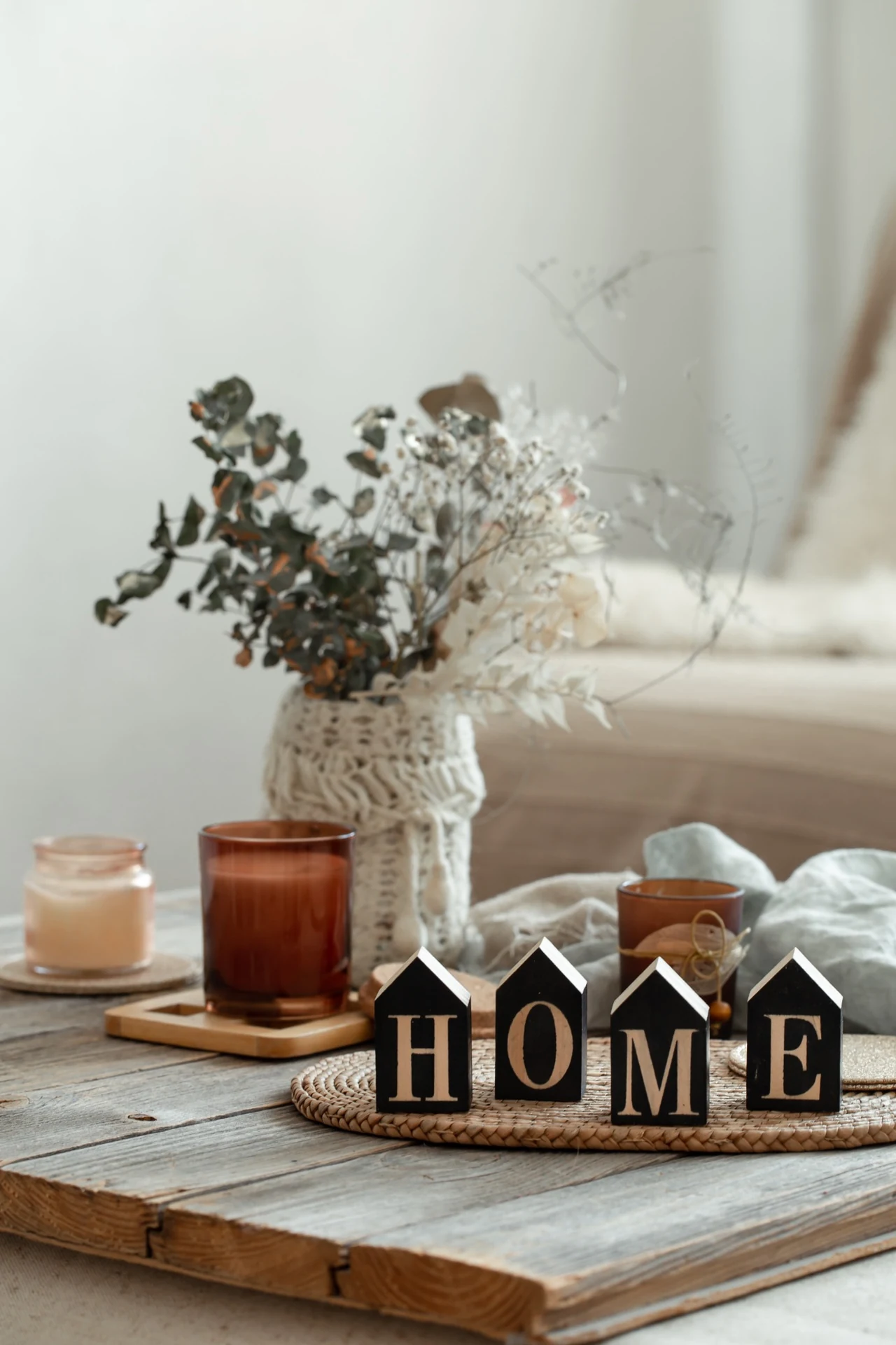 Warm home detail with decorative HOME letters and candles